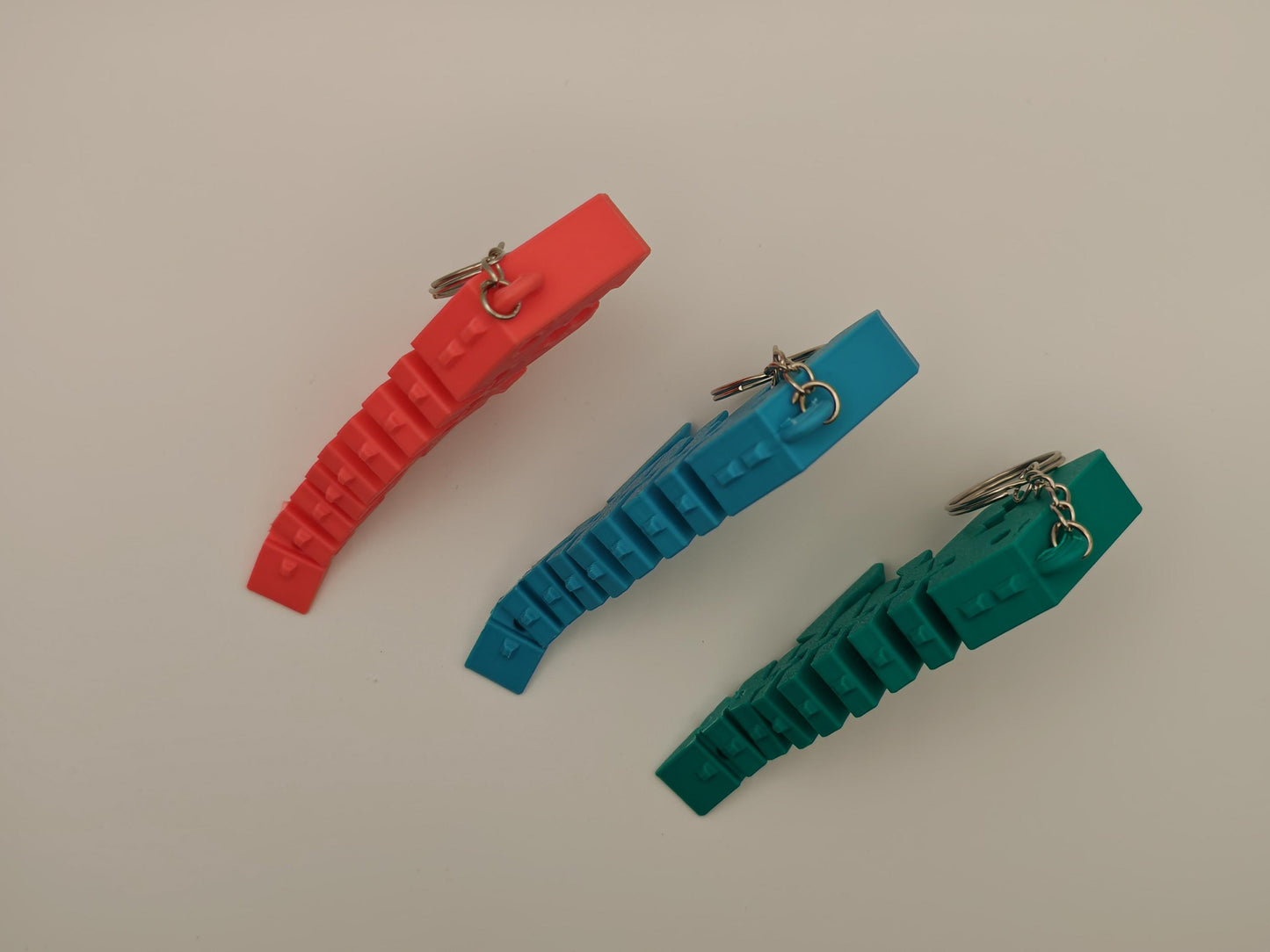 3D printed Flex/fidget dinosaur Keyrings