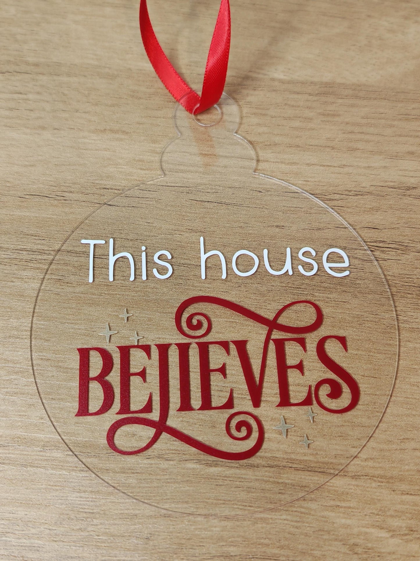 large 10cm Acrylic Bauble - This house believes - Red
