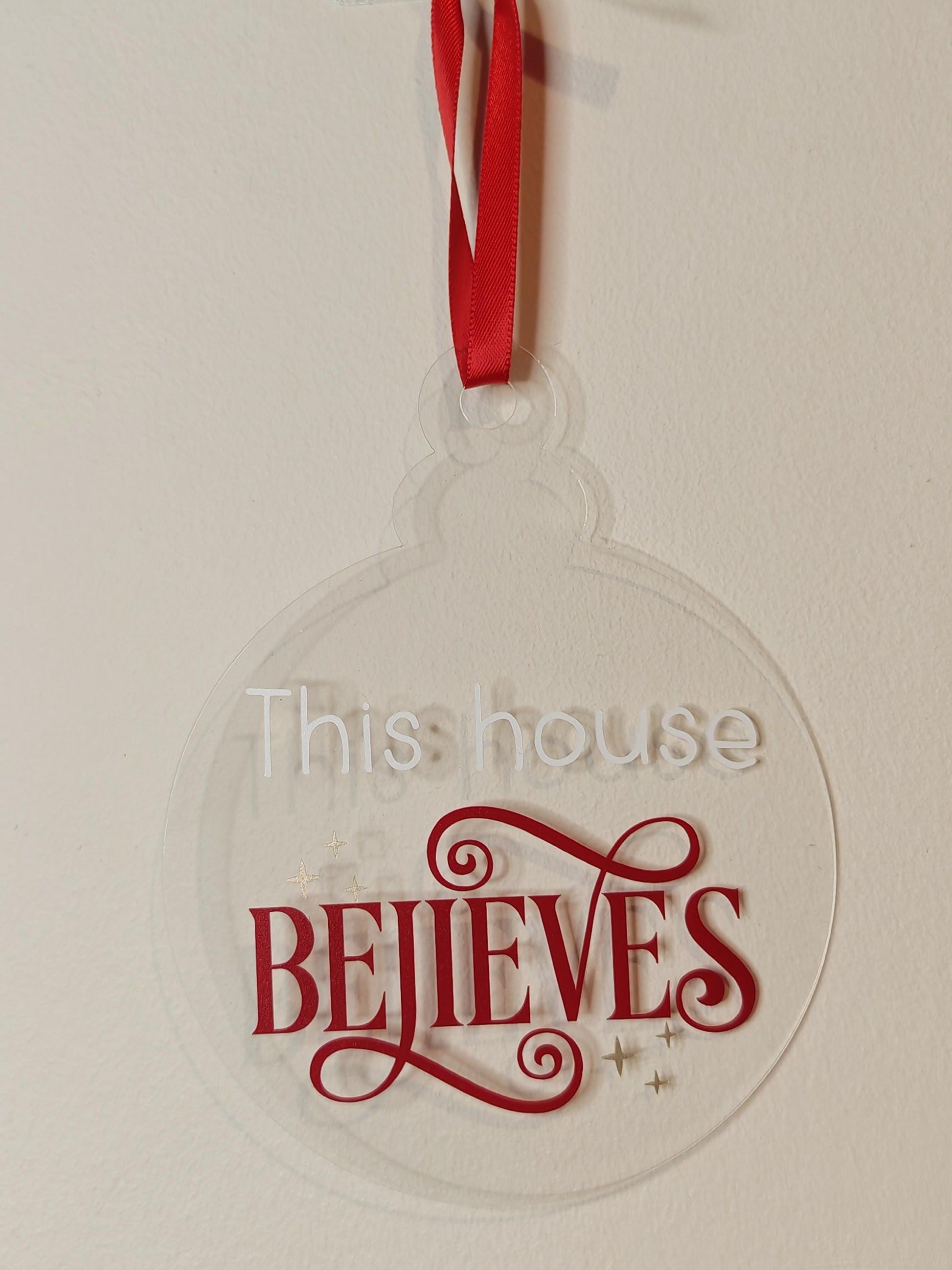 large 10cm Acrylic Bauble - This house believes - Red